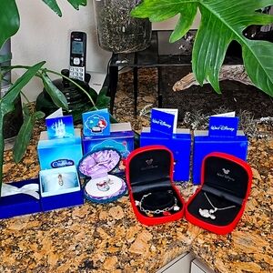 Lot of vintage Disney Jewelry in original packaging
